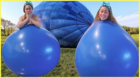people in giant balloons